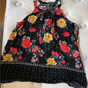 Adorable flowy tank that hides the belly and hips